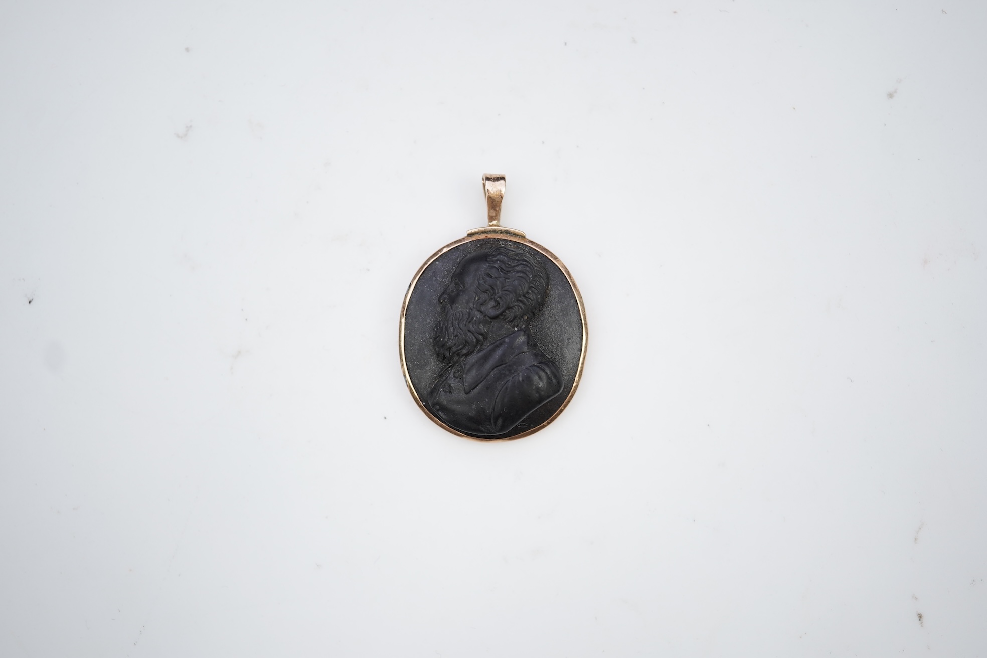 An unusual lava cameo pendant, late 19th century